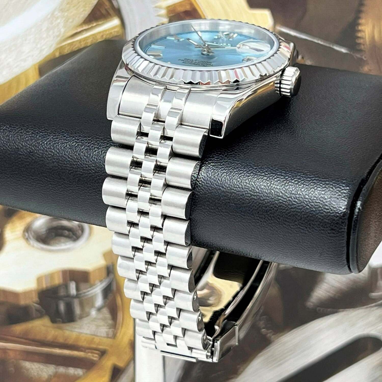 Seiko Mod Ice Blue Roman on cushion side view with polished steel bracelet