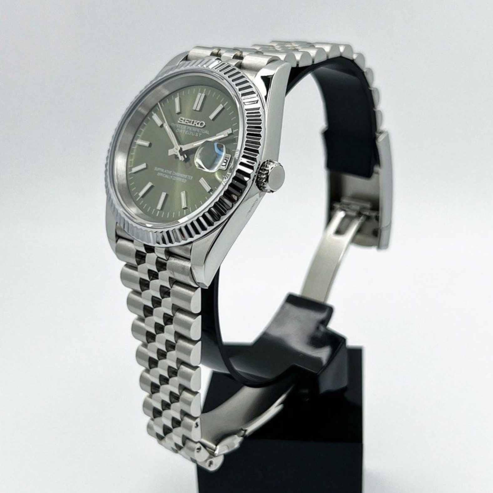 Right-side angled view of Seiko Moddys Datejust Mint Green Dial watch highlighting crown and fluted bezel