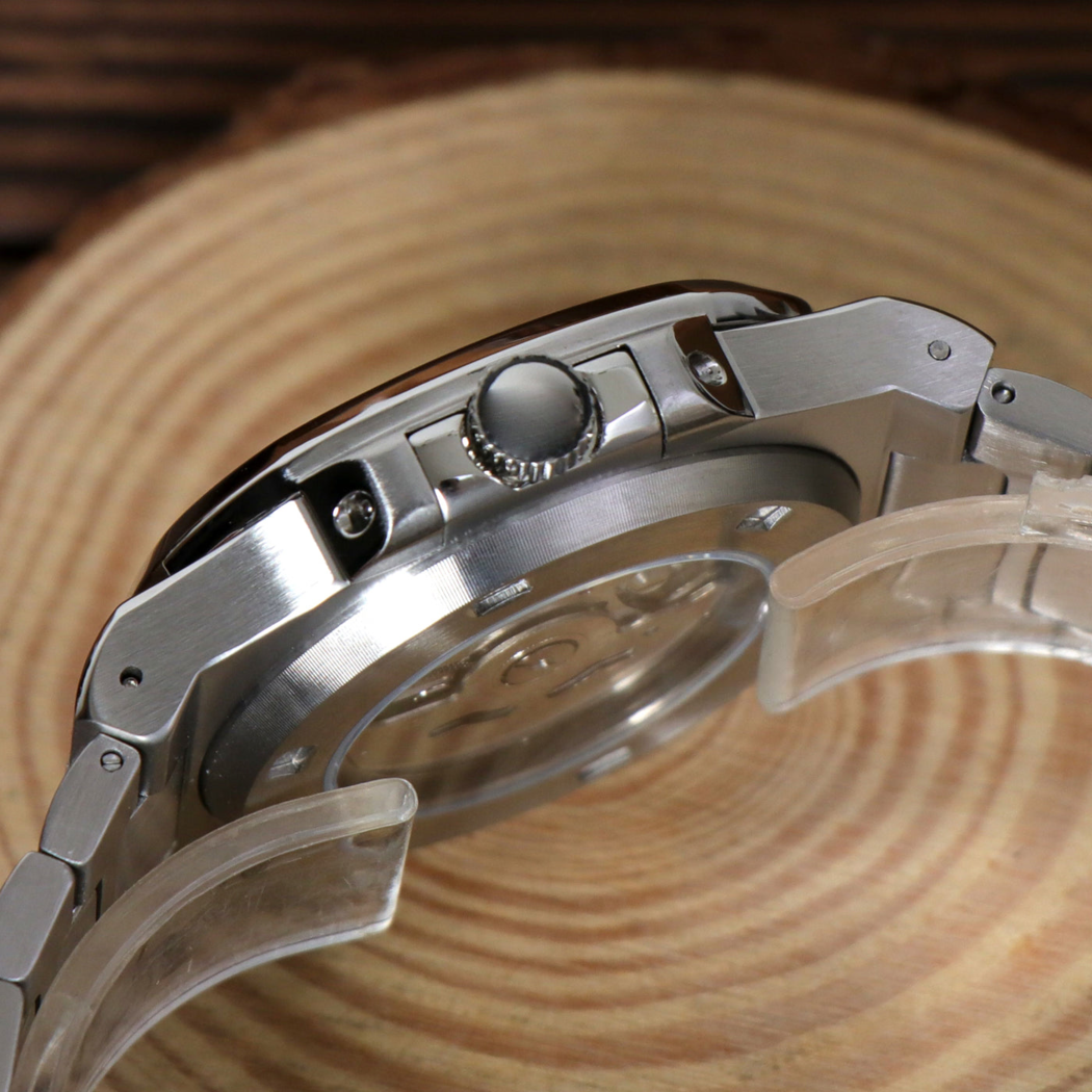 Crown side of Seiko mod Nautilus black showing brushed and polished contrast