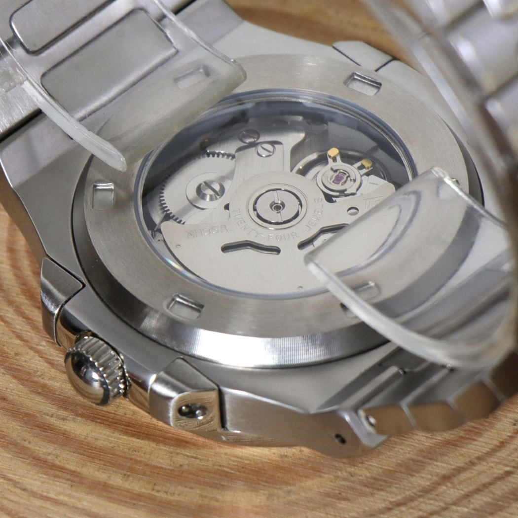 Transparent case back of Seiko mod Nautilus cream showing NH35 automatic movement