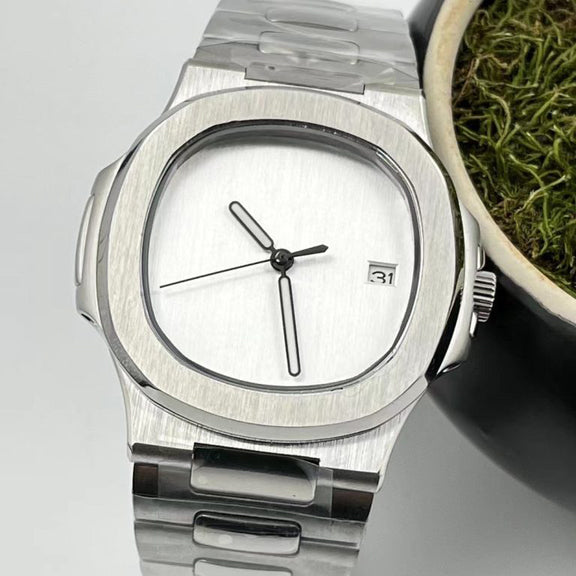 Close up of Seiko mod Nautilus minimalist dial with brushed silver surface and black outlined hands