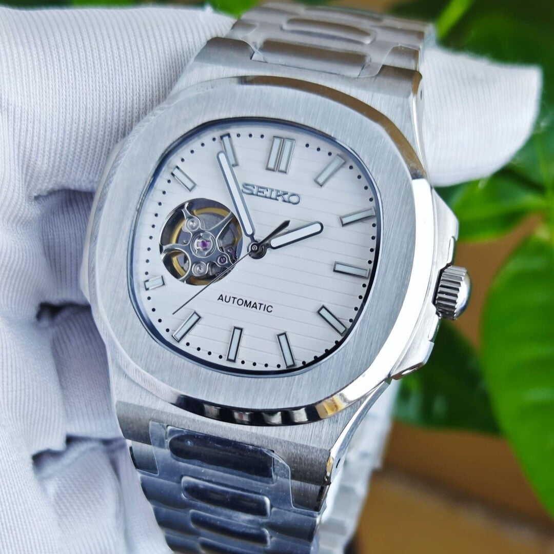 Right angled view Seiko Mod Nautilus Minimalist highlighting brushed steel case and crown detail