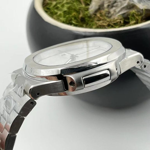 Side view of Seiko mod Nautilus minimalist showing crown and polished case transition