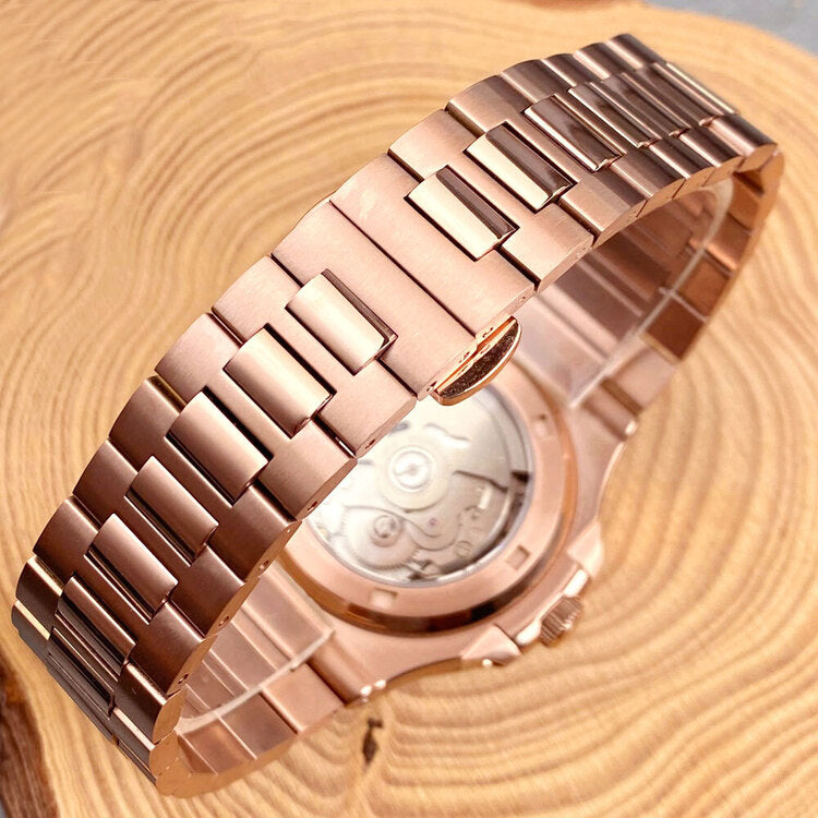 Bracelet of Seiko mod Nautilus rose gold black edition showing polished center links and brushed finish