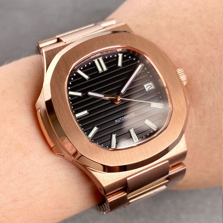 Wrist shot of Seiko mod Nautilus rose gold black edition showcasing proportions and warm metallic tones