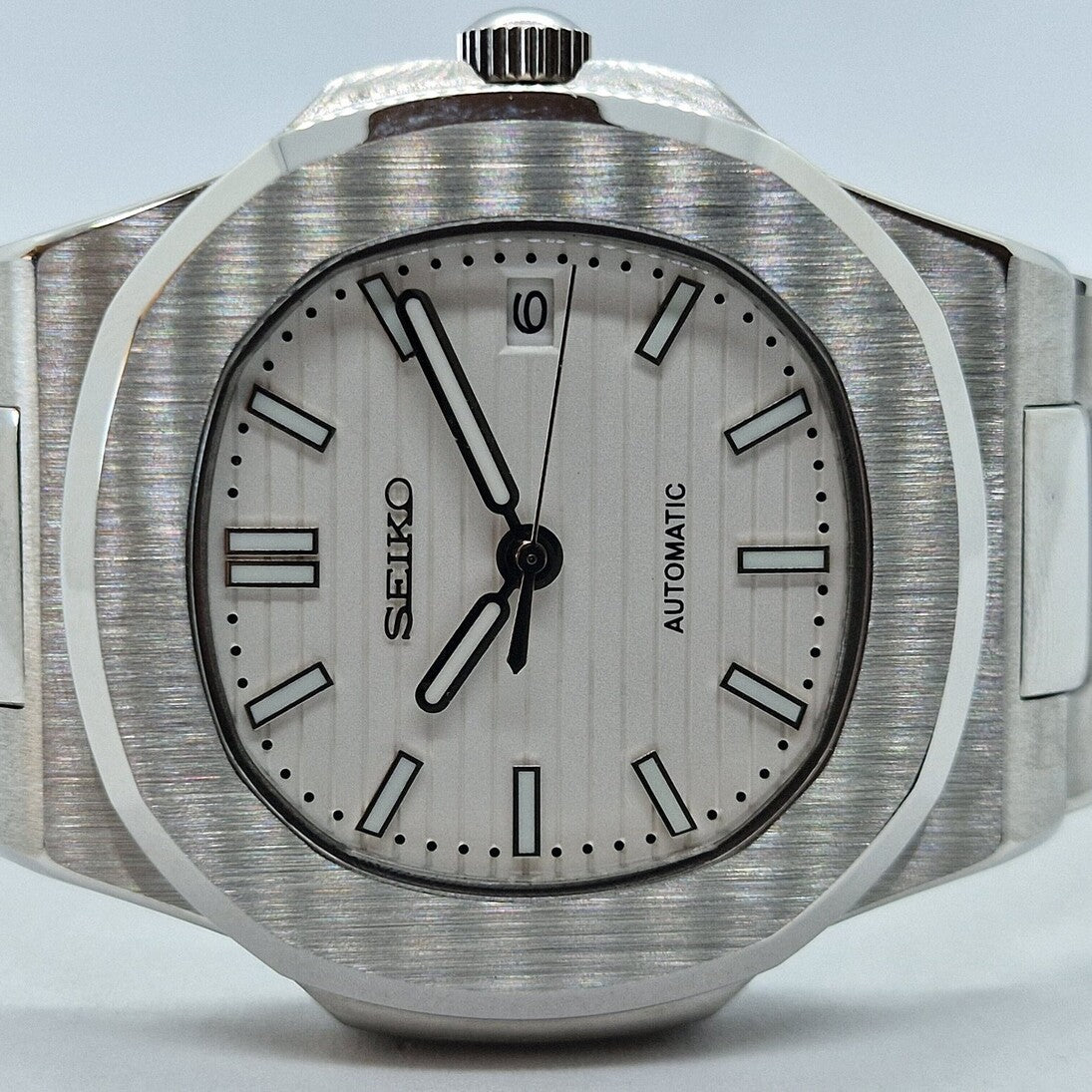 Close up Seiko Mod Nautilus White focusing on vertical dial texture and applied indices