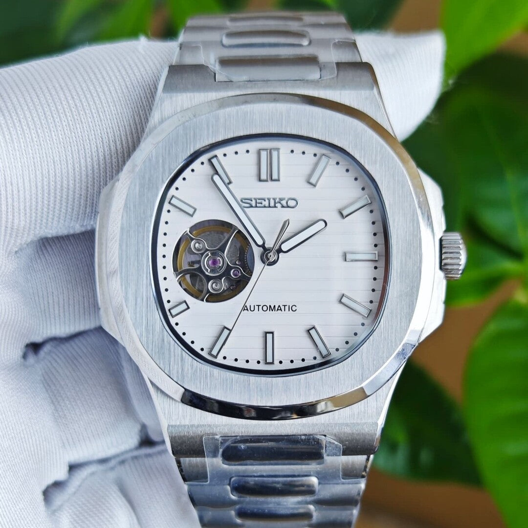 Front view Seiko Mod Nautilus White Open Heart showing visible balance wheel and clean dial