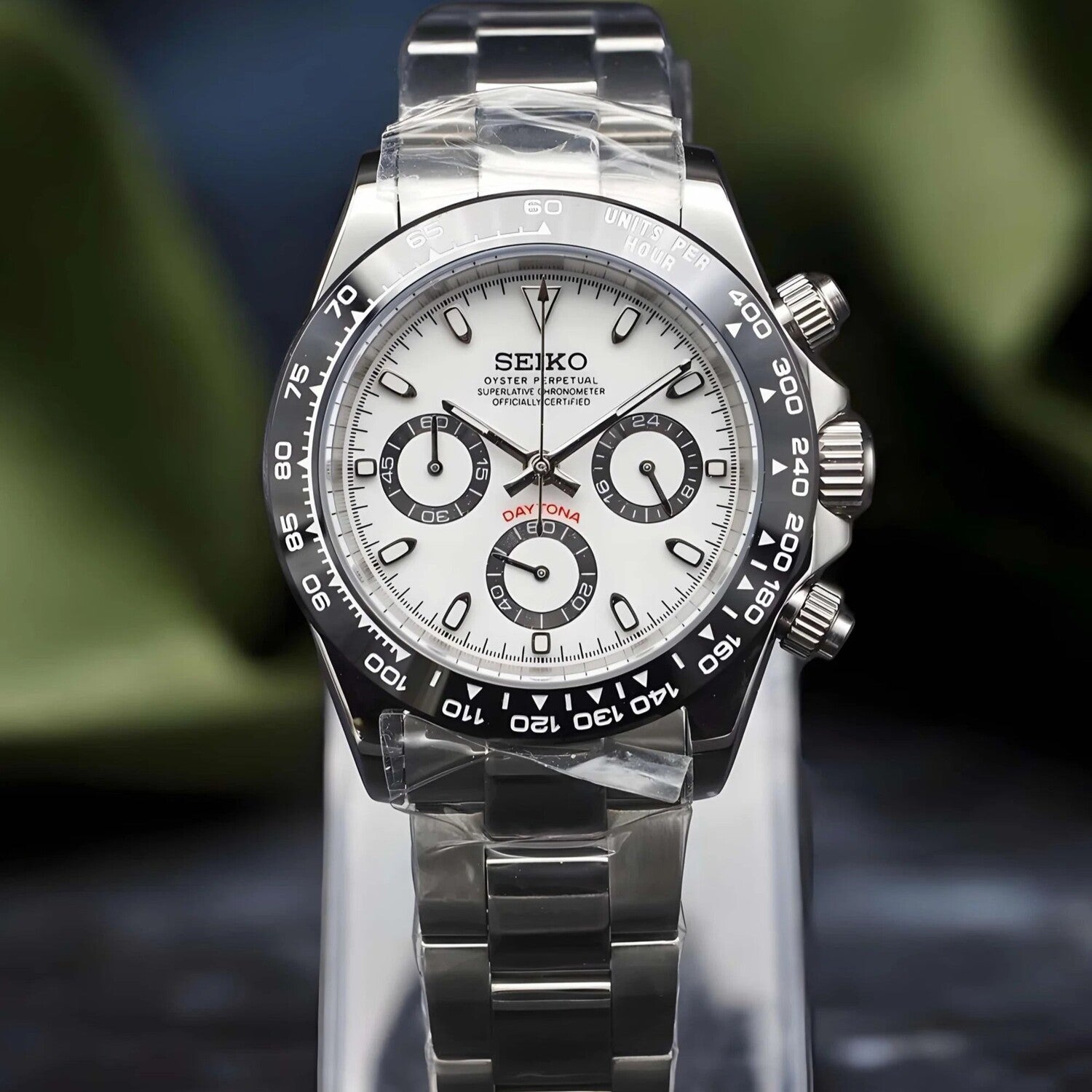 Front view of Seiko Mod Daytona Panda featuring white dial, black subdials, ceramic tachymeter bezel and stainless steel bracelet.