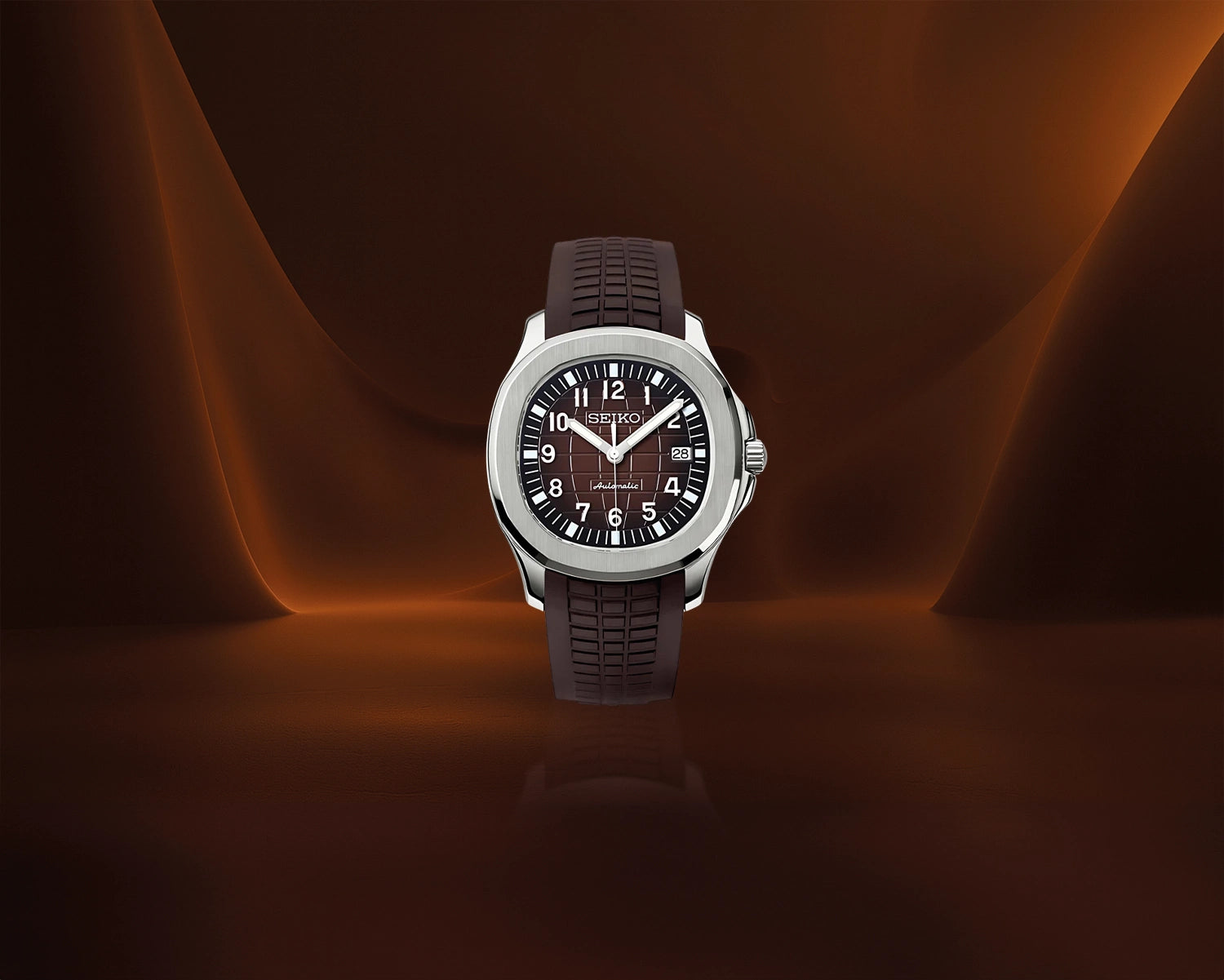 Seiko Mod Seikonaut mit braunem Zifferblatt und Kautschukarmband, sportlich und elegant.