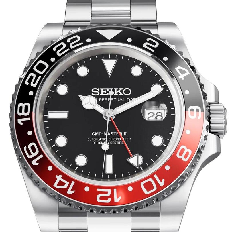 GMT Coke Frontansicht, schwarzes Zifferblatt, roter GMT Zeiger, Cyclops Datumslupe, Leuchtindizes, Coke Keramiklünette